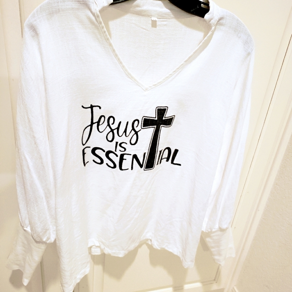 White pullover "Jesus is Essential" Christmas top L white w/black vivid letters